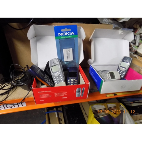 140 - 2 Boxes of Nokia Phones with 2 Chargers. 3 Working, 4 untested