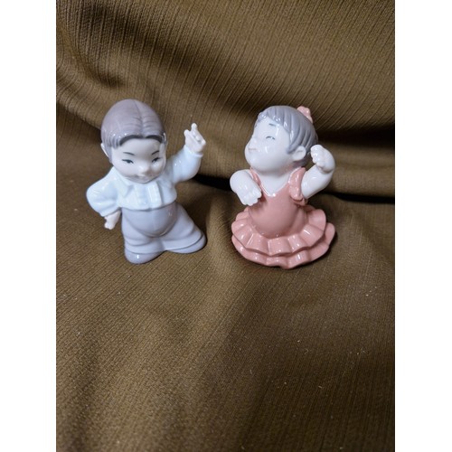 787 - Nao Boy and Girl Figurines