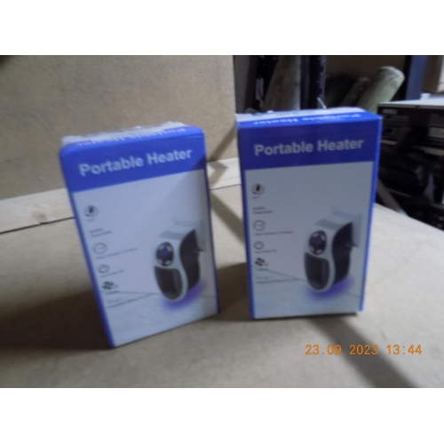 62 - 2 Plug in Portable Electric Heaters