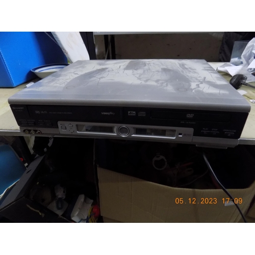 174 - Sharp VHS/DVD Player