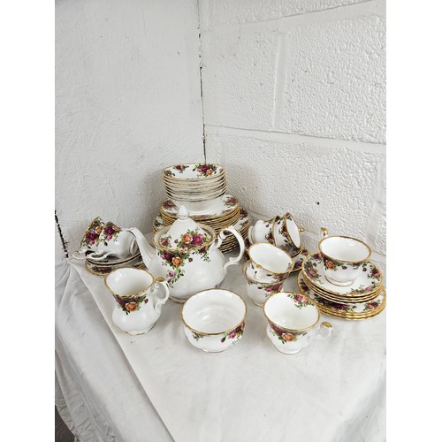 23 - Royal Albert Dinner Service consisting of 8 Large Plates, 8 Medium Plates, 8 Sandwich Plates, 8 Tea ... 