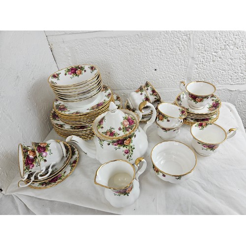 23 - Royal Albert Dinner Service consisting of 8 Large Plates, 8 Medium Plates, 8 Sandwich Plates, 8 Tea ... 