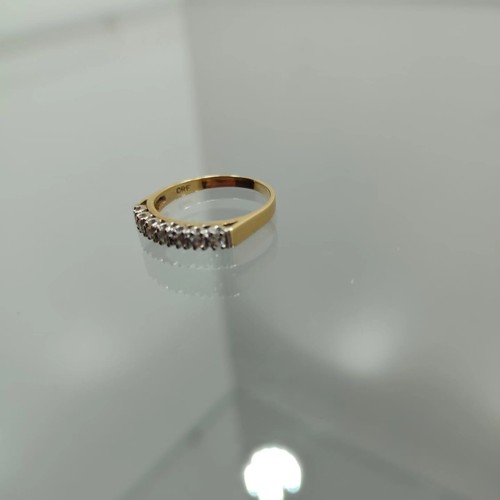 134 - Seven Stone Diamond Half Hoop Eternity Ring: Brilliant-cut diamonds point-set in plain 18ct gold sha... 