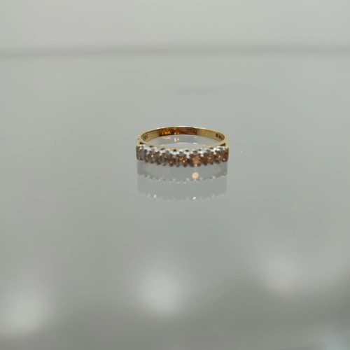 134 - Seven Stone Diamond Half Hoop Eternity Ring: Brilliant-cut diamonds point-set in plain 18ct gold sha... 