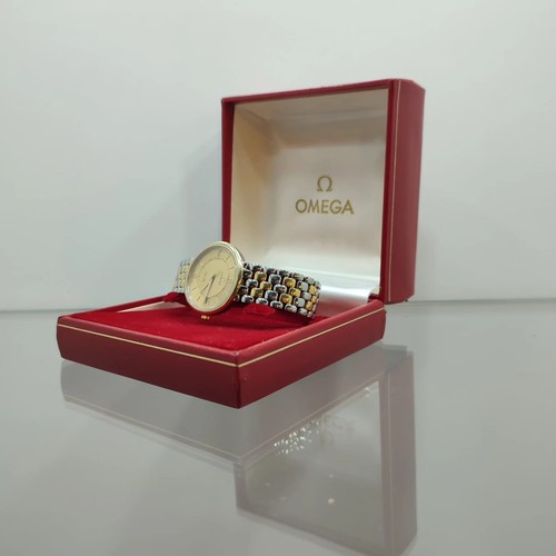 137 - Omega De Ville 33 MM Quartz Watch: Steel & yellow gold case, yellow dial. Steel & yellow gold bracel... 