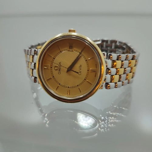 137 - Omega De Ville 33 MM Quartz Watch: Steel & yellow gold case, yellow dial. Steel & yellow gold bracel... 