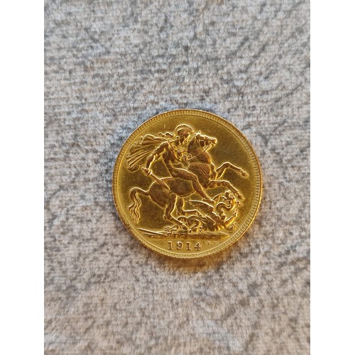 140 - 1914 George V Gold Sovereign Coin: 22 carat gold British coin featuring St. George and Dragon revers... 