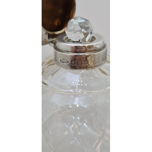 149 - 1923 Hasset and Harper Ltd crystal and Silver Bottle