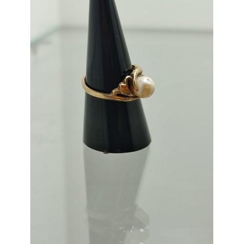 155 - Gold Ring with Pearl setting. This size L ring weighs approximately 2.1 grams with hallmarks 