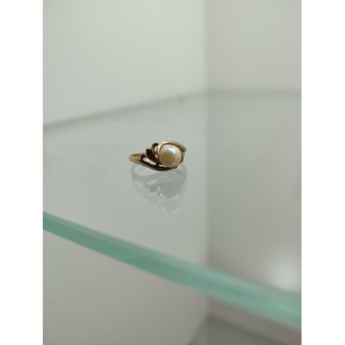 155 - Gold Ring with Pearl setting. This size L ring weighs approximately 2.1 grams with hallmarks 