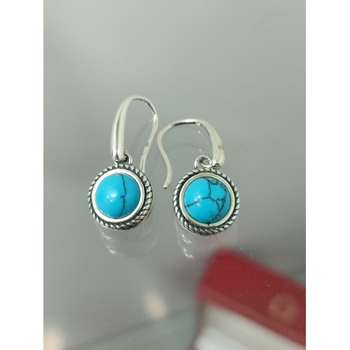 133 - Designer silver earrings with turquoise  earrings in box. The earrings are stamped 925 and have the ... 