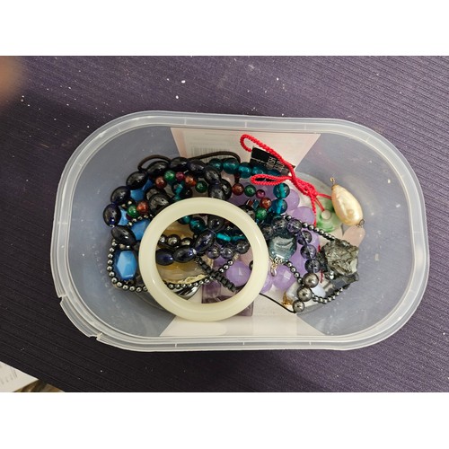 607 - Tub of Precious and Semi-Precious Stones, Pendents etc including Jade Bangle