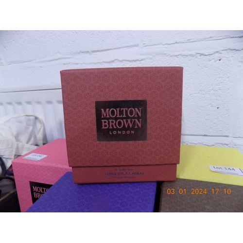 145 - Large Molton Brown Candle Rosa Absolute