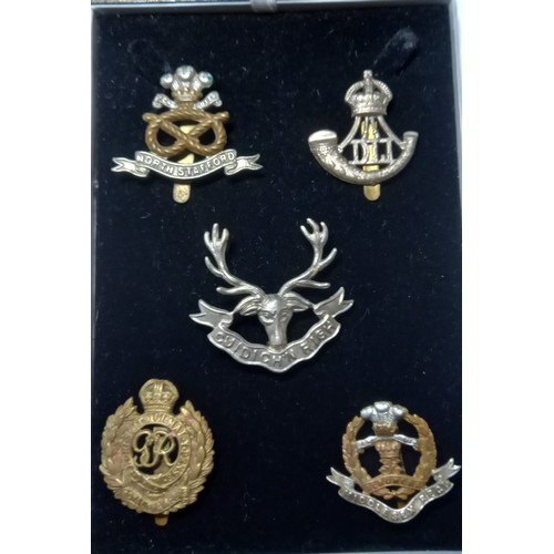 577 - Selection of Military Cap badges