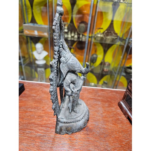 585 - Standing Ganesha with Aureole on Lotus Base. Dating 19th Century