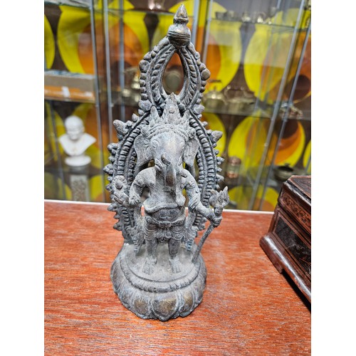 585 - Standing Ganesha with Aureole on Lotus Base. Dating 19th Century