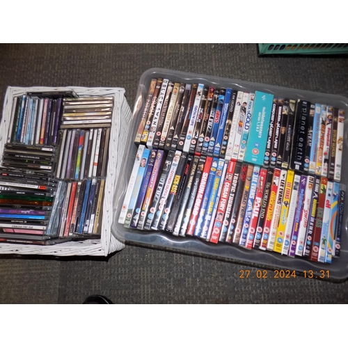 73 - Box of DVD's. Inc Boxsets and Basket of CD's