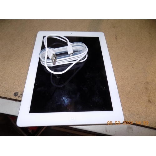 59 - Apple iPad and Charger