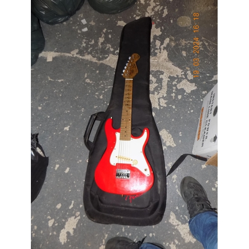 100 - Children's Electric Guitar and Full Size Guitar Case