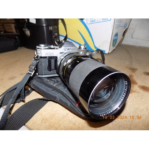 112 - Canon AT1 SLR with Extra Lens