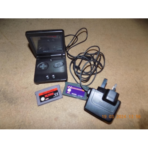 49 - Game Boy Advance SP with 2 Games and Charger. w/o