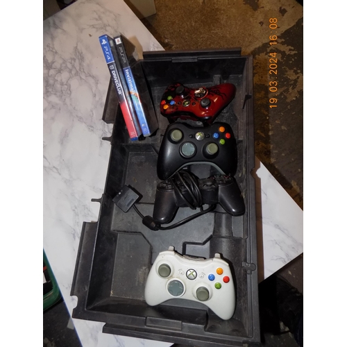 91 - Selection of Gaming Controllers and 2 Games