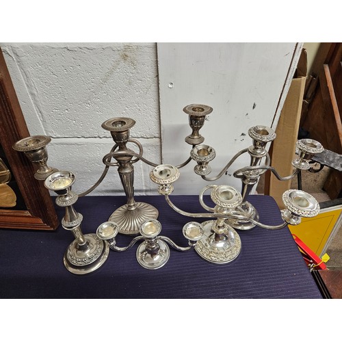 581 - 4 Silver Plated Candelabra and Candle Sticks