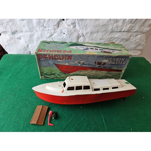 34 - Penguin Series 4 Long Range Clockwork Cabin Cruiser