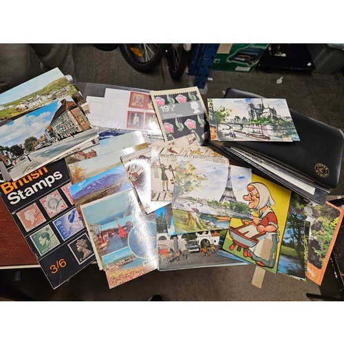 A Booklet of Stamps, Postcards, Firstday Covers and Gibbons Check List