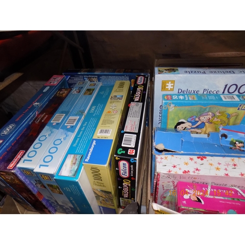 140 - 2 Boxes of Jigsaws