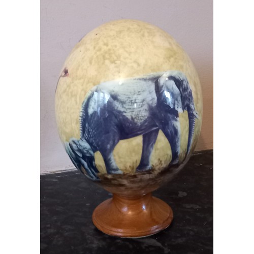 569 - Painted Ostrich Egg on Stand