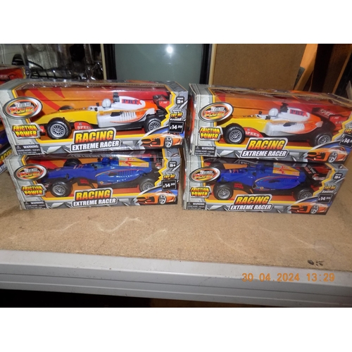 52 - 4 New Racing Extreme Friction Powered Racers