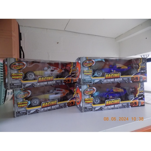 130 - 4 New Racing Extreme Friction Powered Racers