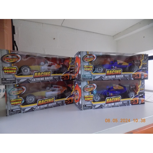 131 - 4 New Racing Extreme Friction Powered Racers