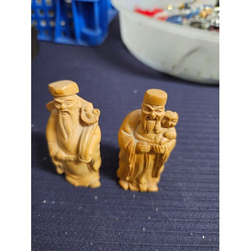 656 - 2 Wooden Oriental Carvings