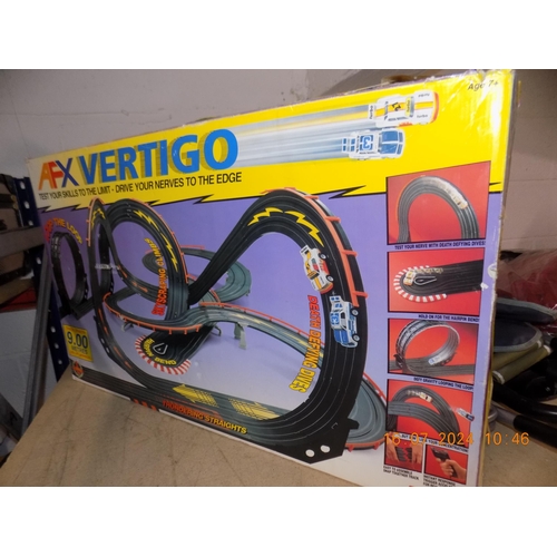 91 - Vintage Tomy AFX Vertigo Race Track with Cars
