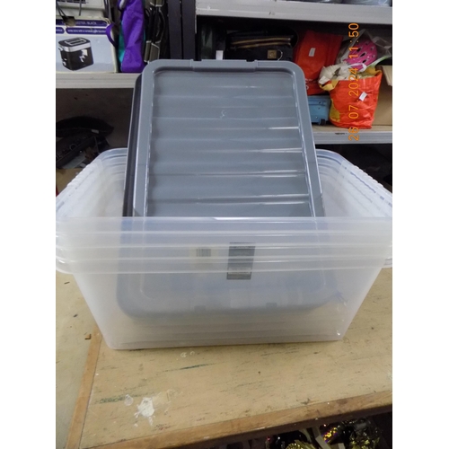 488 - 4 Plastic Storage Tubs with Lids