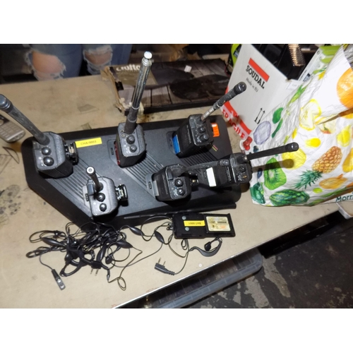 339 - 6 Motorola 2-Way Radio's and 4 Earpeices