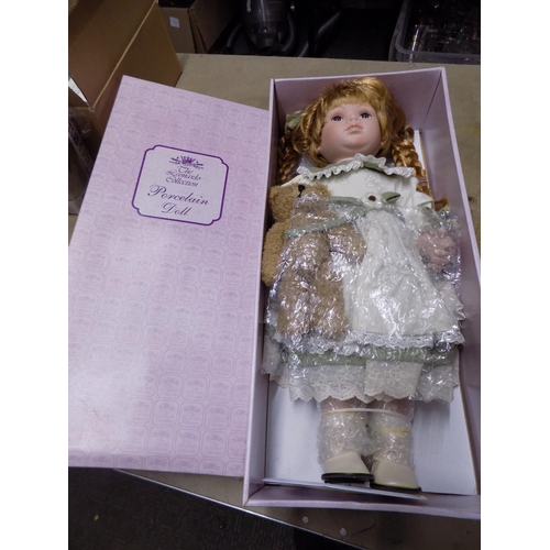 303 - Leonardo Collection Porcelain Doll