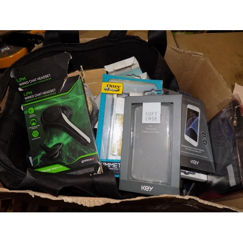 5A - Box of New Phone Cases and Head Set