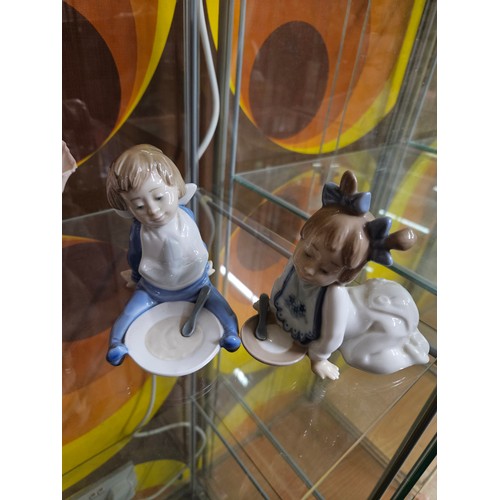 618 - 2 Nao Baby Figurines