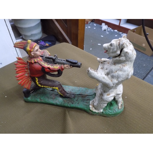 847 - Cast Iron Red Indian Shooting Bear Money Bank