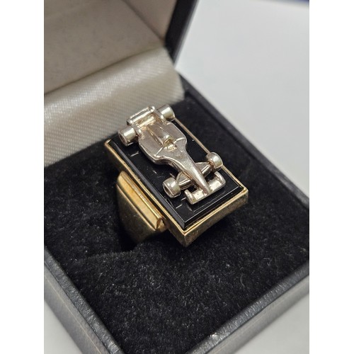 1154 - 9ct Gold F1 ring 11.2g