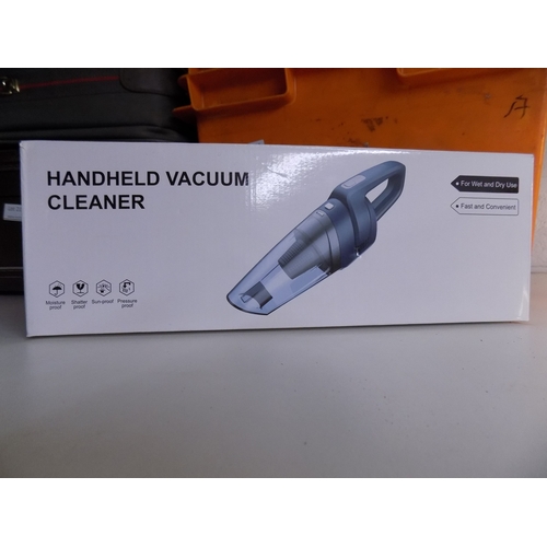 217 - Boxed Handheld Vac. Almost New w/o