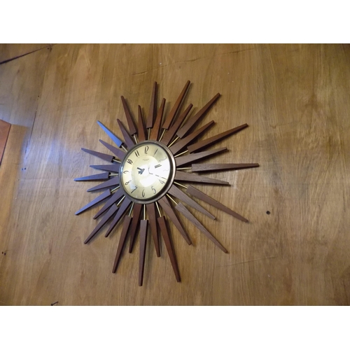 340 - Mid Century Astley and Wilson Starburst Clock. Diameter 65cm