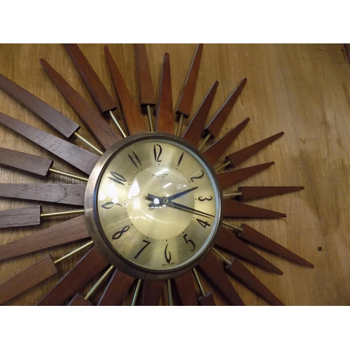 340 - Mid Century Astley and Wilson Starburst Clock. Diameter 65cm