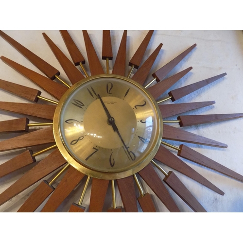 375 - Mid century Astley and Wilson Sunburst Clock. Diameter 56cm