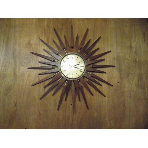 295 - Mid Century Astley and Wilson Starburst Clock. Diameter 65cm