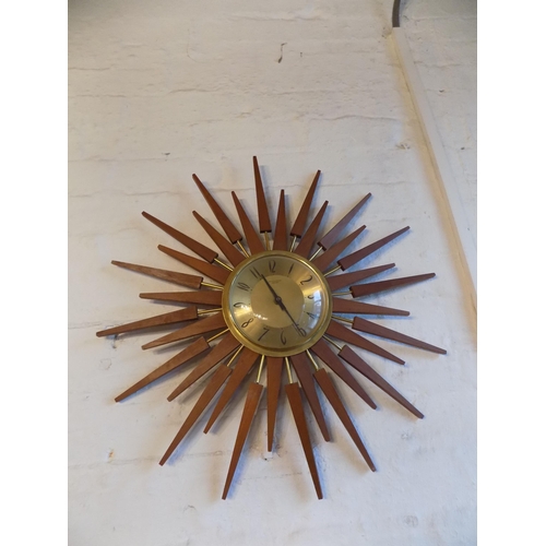 366 - Mid century Astley and Wilson Sunburst Clock. Diameter 56cm