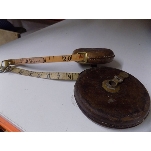 73 - 2 Vintage Tape Measures